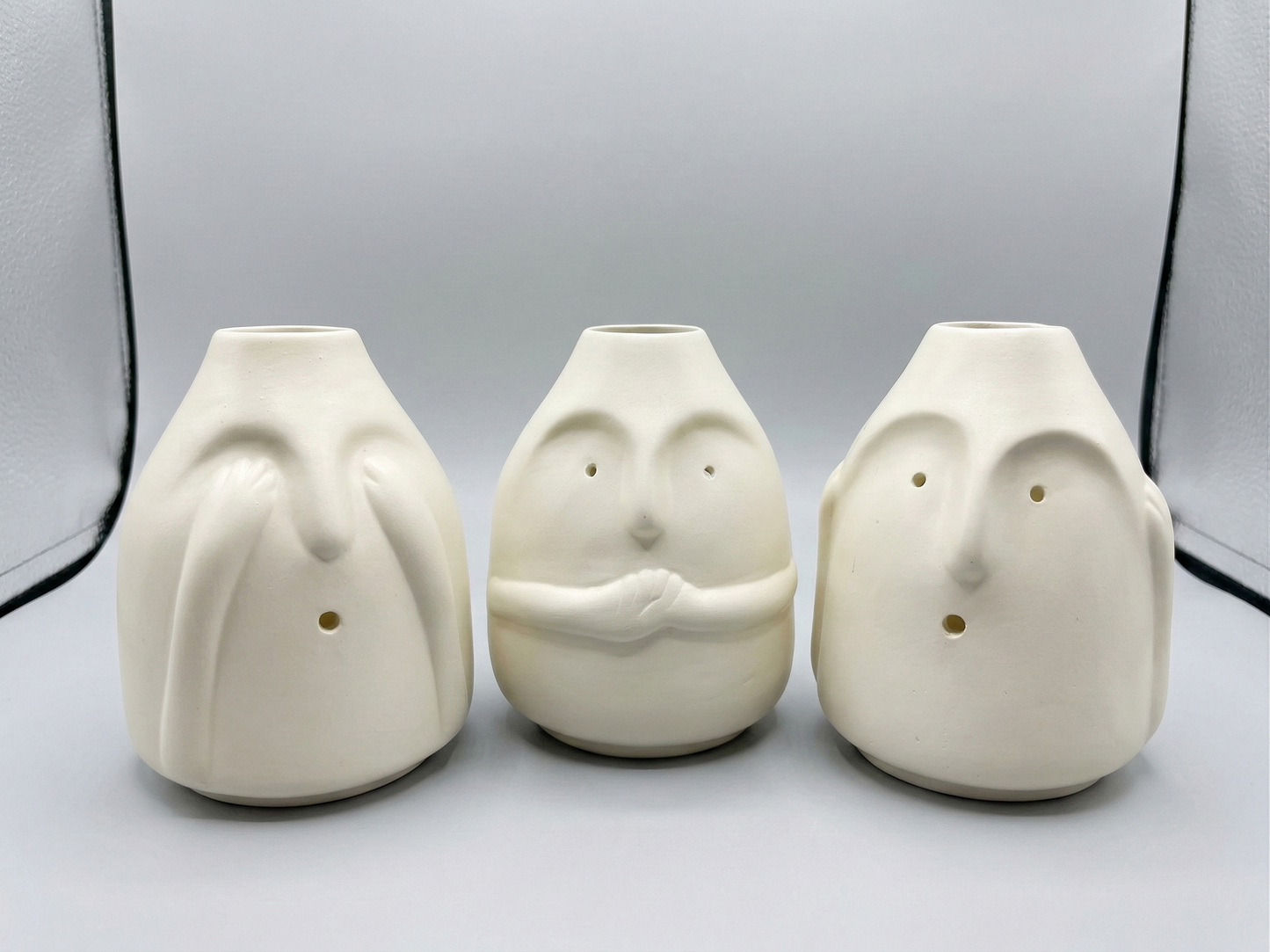 Serene Visage Ceramic Vase Trio